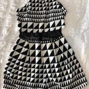 Jealous Tomato Romper size small. More of a dressy outfit, not beach romper